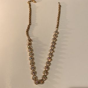 Necklace with Iridescent stones with gold detail
Clasp closure